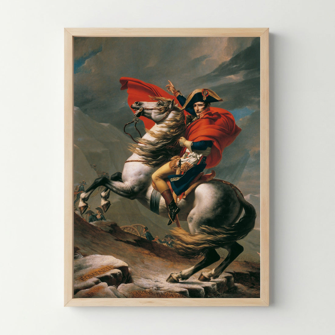 Cadre en bois avec affiche classique, portrait d’un homme en uniforme sur un cheval blanc dressé, fond montagneux.