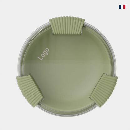 Boîte déjeuner ronde verte olive avec couvercle transparent et coins renforcés, vue du dessus