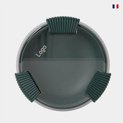 Lunchbox ronde vert foncé avec couvercle hermétique et coins en silicone, vue du dessus.