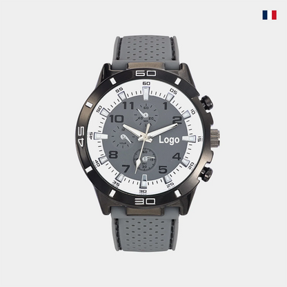 Montre homme sport cadran gris et noir, bracelet silicone perforé, affichage analogique.